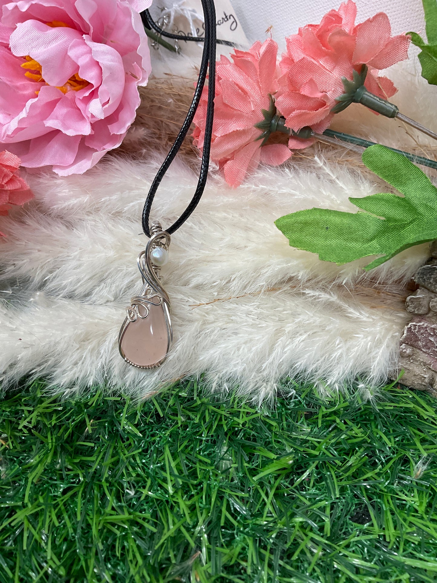 Rose Quartz wrapped in Sterling Silver/