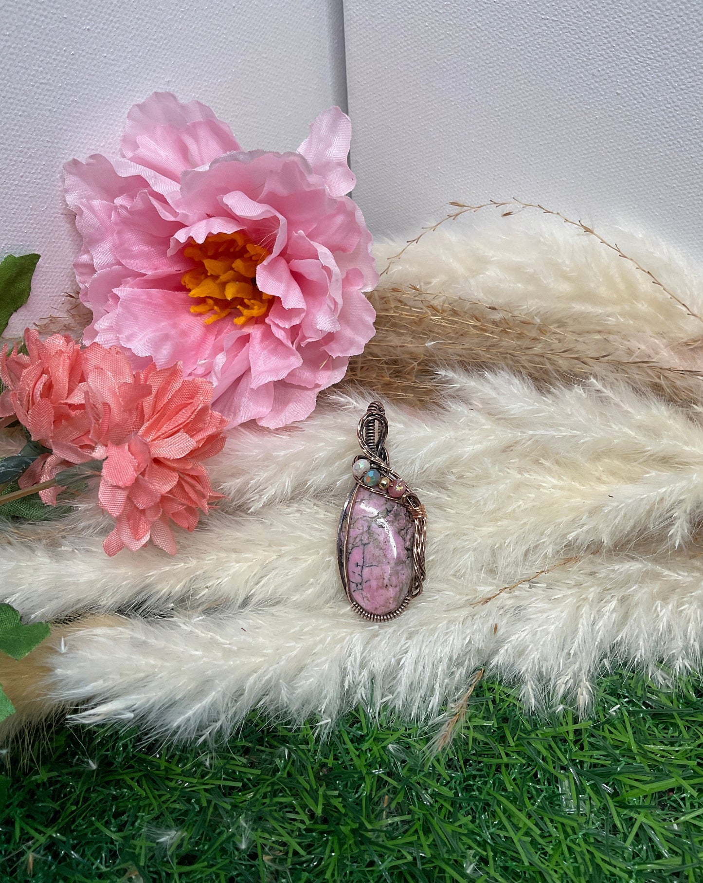 Rhodonite wrapped in Oxdized Copper