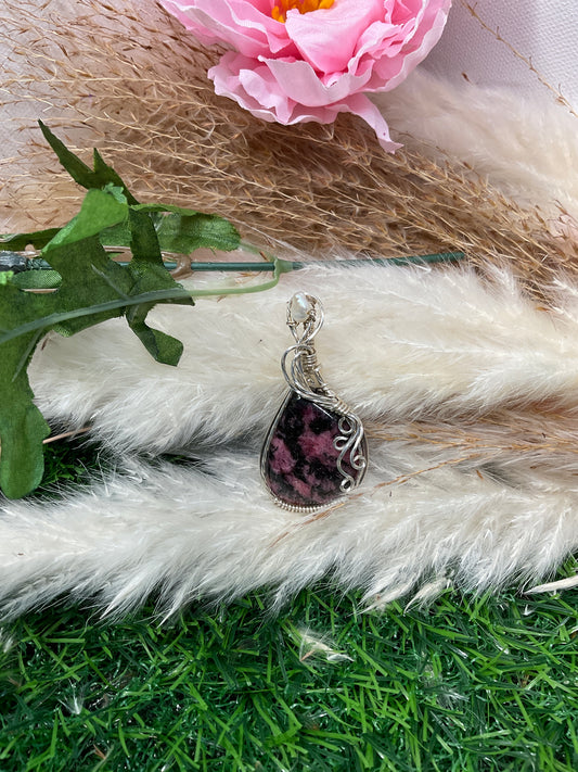 Rhodonite Gemstone wrapped in Sterling Silver