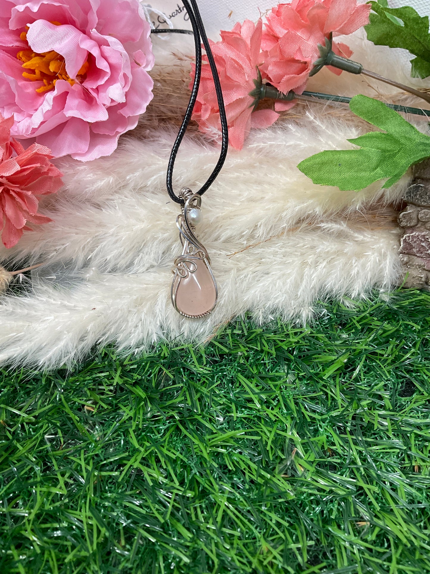 Rose Quartz wrapped in Sterling Silver/