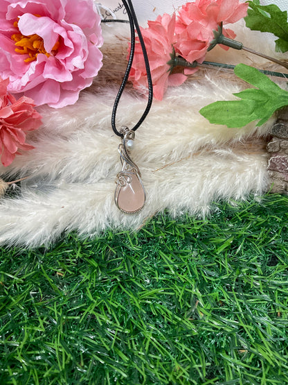 Rose Quartz wrapped in Sterling Silver/