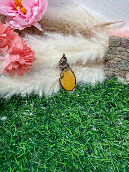 Orange Calcite wrapped in Oxidized Copper-