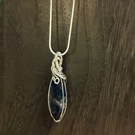 Sodalite Pendant Wrapped in Sterling Silver