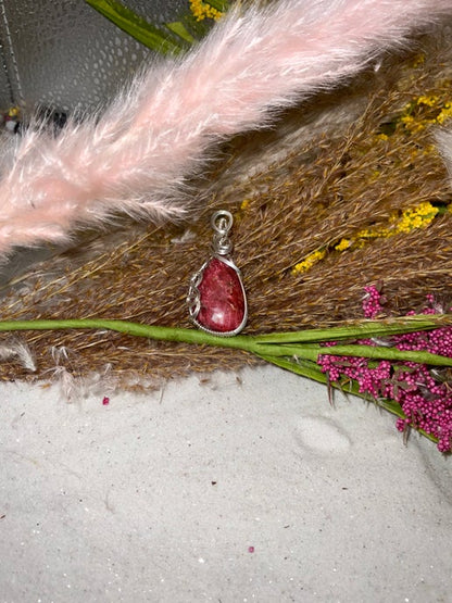 Thulite Pendant wrapped in 9.25 Sterling Silver.