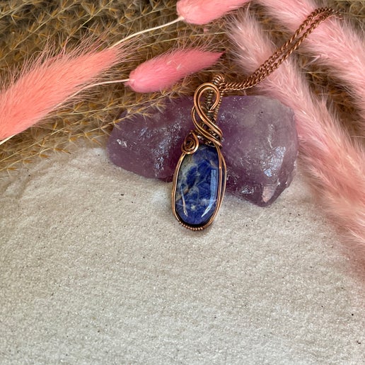 Sunset Sodalite Wrapped in Antique Copper.